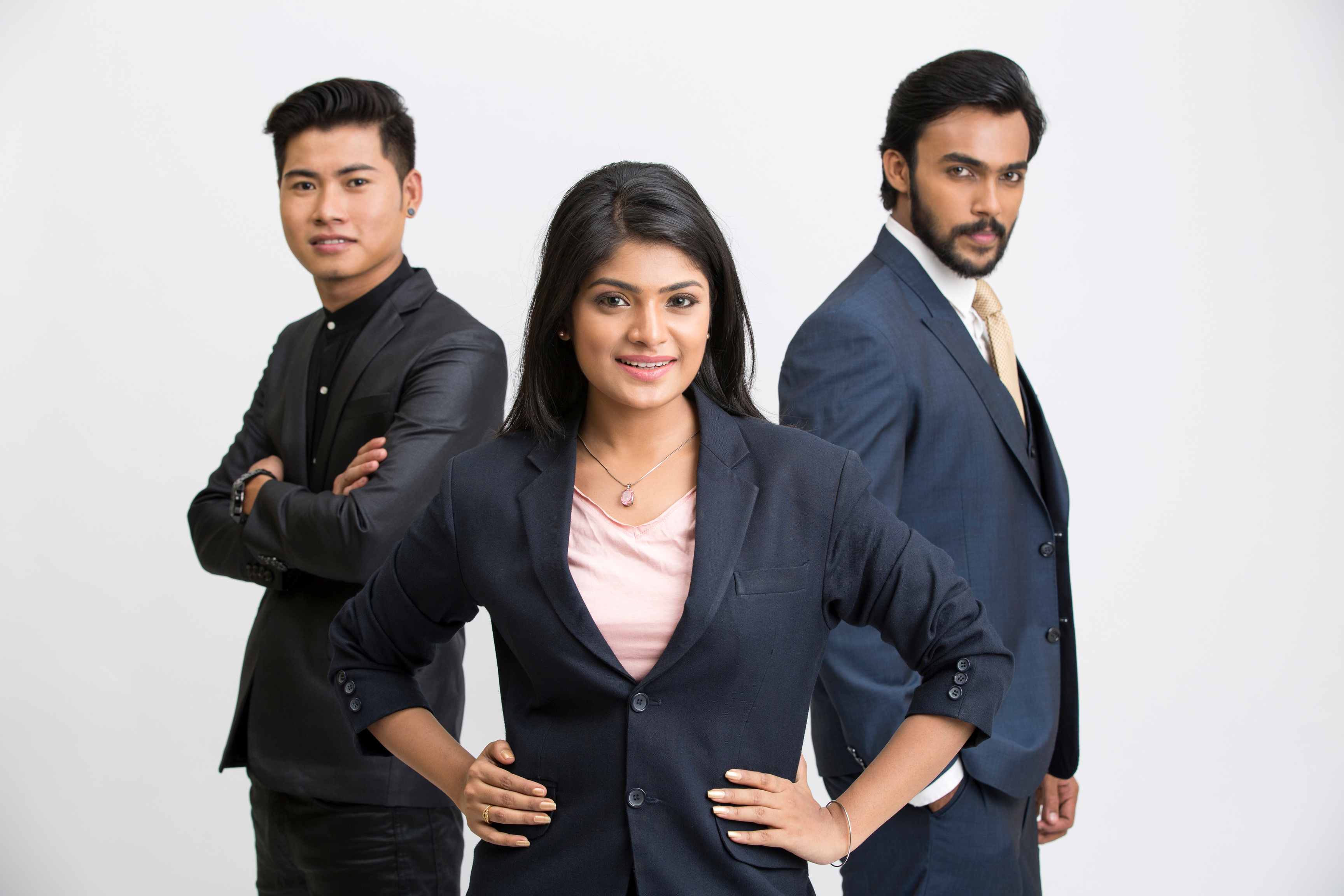 Indian businessman standing with his team